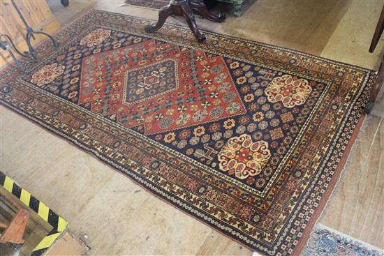 Caucasian red & blue  rug, 8ft 11in by 4ft 6in(-)